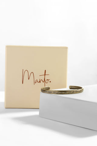 Manto Unisex Gold Stainless Steel Talaash Cuff Bracelet (Kara) with Urdu Calligraphy of Poetry by Nida Fazli