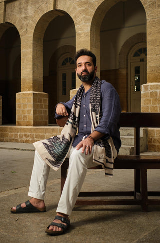 Muzaffar Bukhari wearing Manto's Unisex Teacher's Day Azm Stole with Urdu Calligraphy