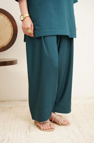 Raya Solid Teal Co-ord set is made from ultra-soft wash and wear material featuring short shirt with collar and placket details and shalwar with relaxed fit