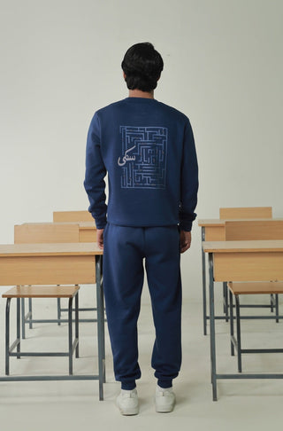 Manto's Unisex Premium Fleece Blue Sanki Sweatshirt featuring Urdu Sanki Motif at the Back Paired with Blue Jogger Pants