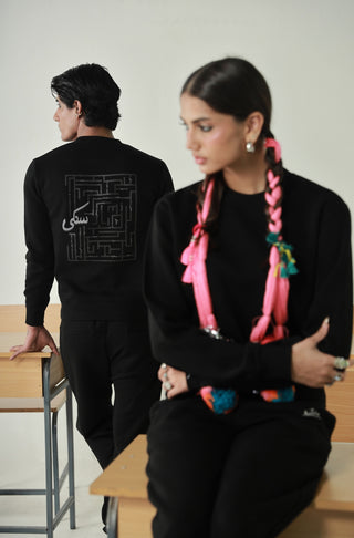 Manto's Unisex Premium Fleece Black Sanki Sweatshirt featuring Urdu Sanki Motif at the Back Paired with Black Jogger Pants