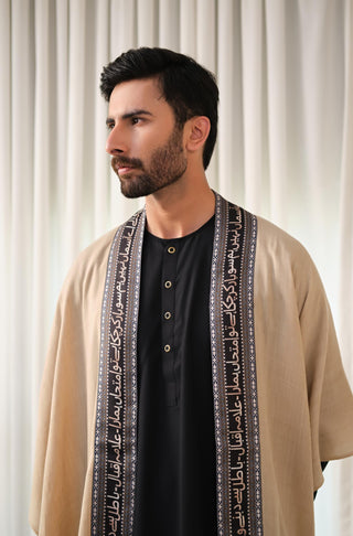 Manto Unisex Ready To Wear Acrylic Wool Outerwear Sabaat Cape Beige & Black Featuring Urdu Poetry by Allama Iqbal