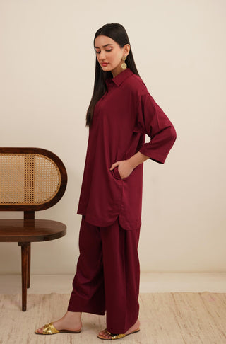 Raya Solid Red Co-ord set is made from ultra-soft wash and wear material featuring short shirt with collar and placket details and shalwar with relaxed fit