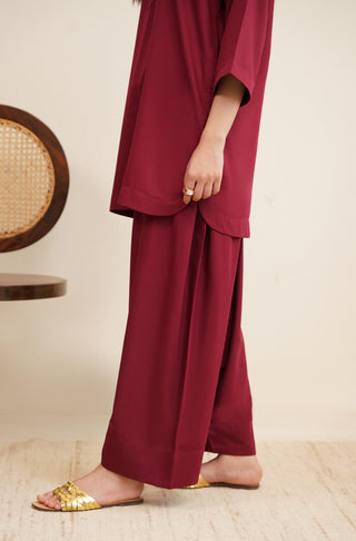 Raya Solid Red Co-ord set is made from ultra-soft wash and wear material featuring short shirt with collar and placket details and shalwar with relaxed fit