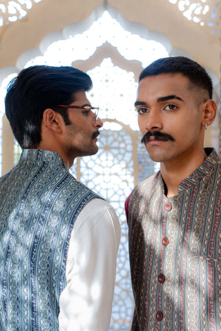 Shopmanto, wear manto, manto clothing brand, manto vasket, waistcoat, manto kaavish vasket, kaavish vasket, manto winter wear, manto eastern, urdu calligraphy, manto khaddar kaavish vasket teal and blue, khaddar waistcoat, khaddar men waistcoat, manto men, men waistcoat, festive wear